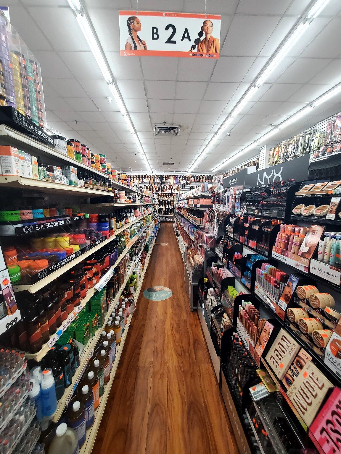 Cosmetics aisle inside One Plaza Beauty Supply